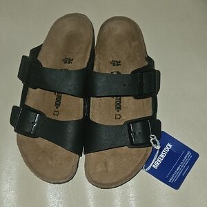 Birkenstock Arizona Kids Black Sandals with Adjustable Straps and Cork Footbed